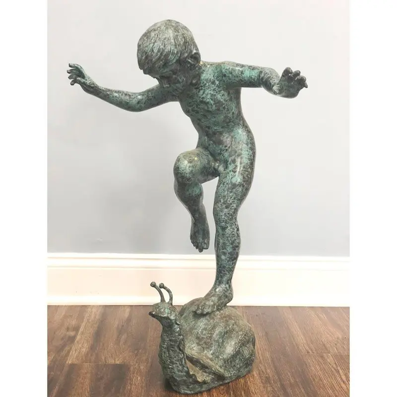 Boy Balancing On Snail 1