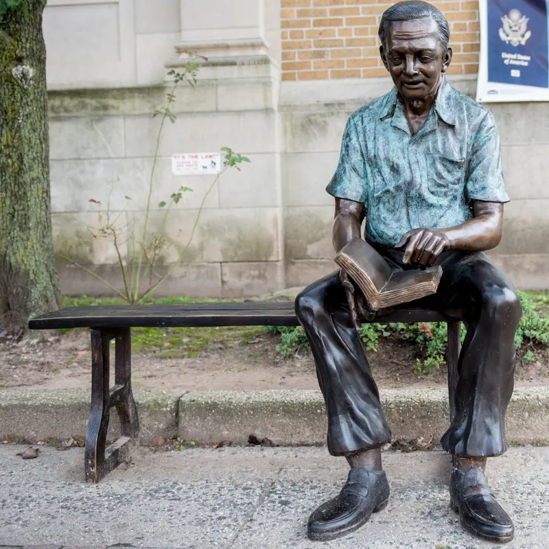 Bronze Grandfather Statue Reading On Bronze Bench 1