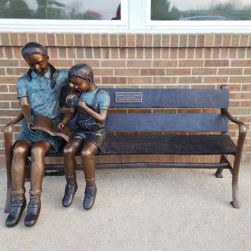 Lending A Helping Hand Statue On Custom Bronze Bench 1