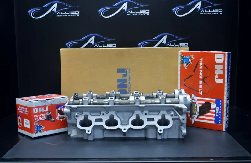 Mazda Cylinder Head 2.0L 1991Cc L4 Dohc With Dist, Head, Gasket, Head Bolts, Timing Belt, Tensioner And Water Pump, Year:93-97 1