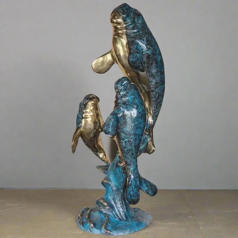 Three Swimming Manatees Statue 1