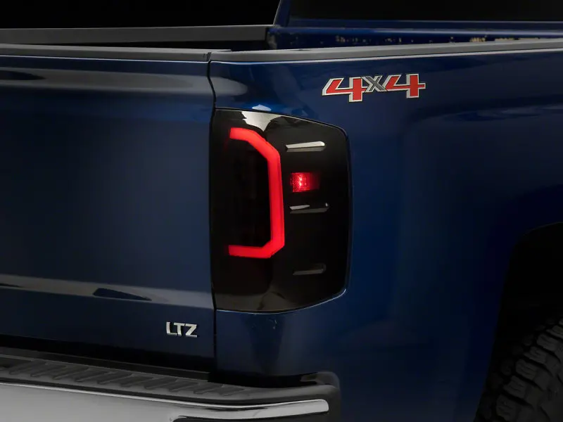 Raxiom Axial Series Led Tail Lights For 2014–2018 Chevrolet Silverado 1500 – Black Housing, Smoked Lens 1